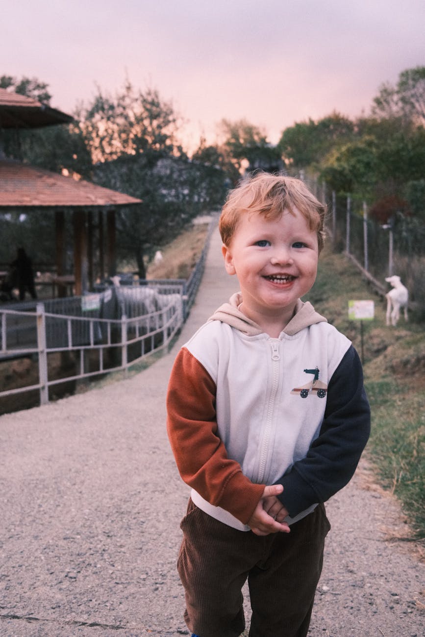 blond boy with blue eyes smiling